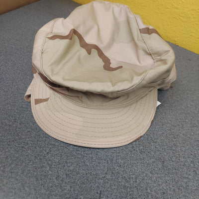 3 Color Desert Camouflage CapAuthentic Military 3 color Desert Camouflage Cap, pattern 3 color. 80% Cotton, 20% Nylon. Made with earflaps to keep your ears warm in the cooler months and has wateDesert Camouflage Cap