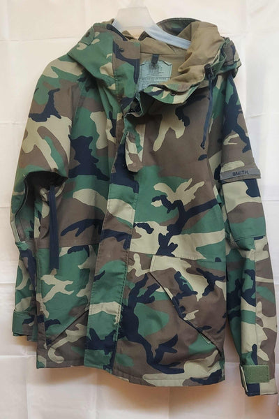 Parka ColdWet Weather Camouflage G.I. Parka, Cold/Wet Weather CamouflageParka, Cold Weather Camouflage Jacket. The parka is made of nylon, is waterproof and has a full lining, waist adjustment, and permanently attached hood, Velcro cuffsParka, Cold/Wet Weather Camouflage