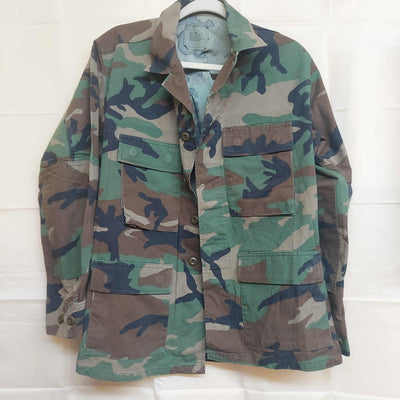 Fatigue Blouse Military Issued Fatigue Blouse, Woodland Camo.  These are originals, button front, pockets and cuffs, built in cinch sides and button fly.  NSN # 8415-01-084-1642 depending on the sFatigue Blouse, Military Issued